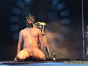 mischievous fetish needle display on stage